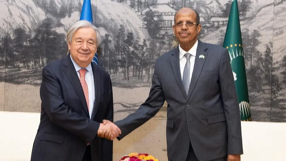 AU Commission Chairperson Mahmoud Ali Youssouf (right), greets Secretary-General António Guterres, in Addis Ababa.