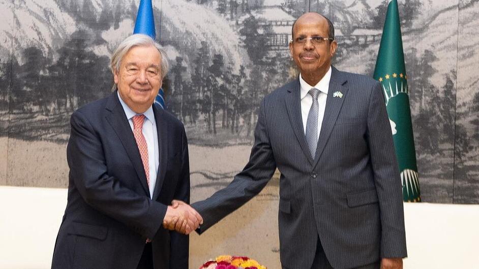 AU Commission Chairperson Mahmoud Ali Youssouf (right), greets Secretary-General António Guterres, in Addis Ababa.