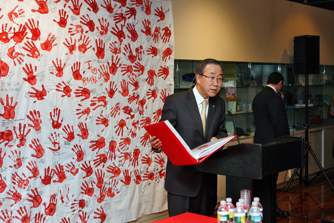 Secretary-General Ban Ki-moon (right) participates in the launch of the ""Red Hand Day Campaign"" to raise the global awareness of the plight of child soldiers through public protests, demonstrations and other activities.