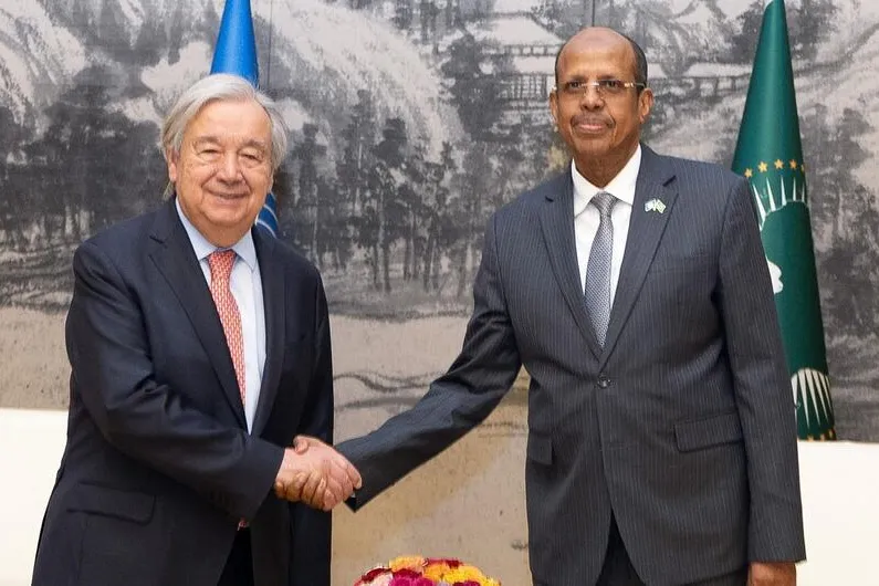 AU Commission Chairperson Mahmoud Ali Youssouf (right), greets Secretary-General António Guterres, in Addis Ababa.