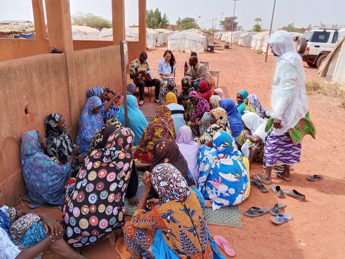 UNOAU Officer engages with women and children in IDP camp on March 11, Mali